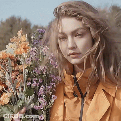 Gigi Hadid Holding Flowers GIF