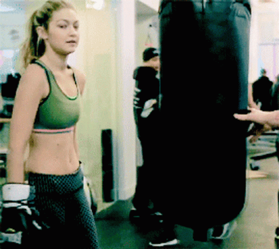 Gigi Hadid Hugging The Punching Bag GIF