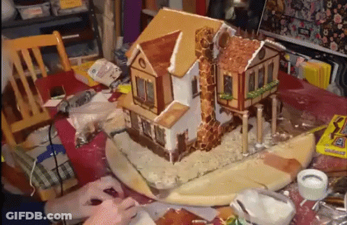 Gingerbread House Being Built GIF