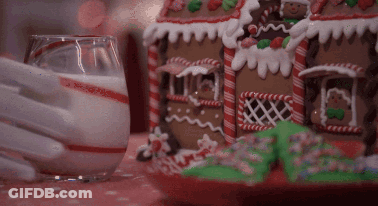 Gingerbread House Next To Milk GIF