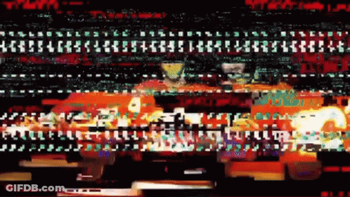 Gingerbread Man Covered In Confetti Saying Happy New Year GIF