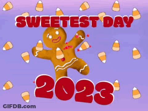 Gingerbread Man Holding Candy Corn Sweetest Day 2022 GIF