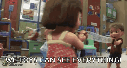 Girl And Boy Playing With Toys Saying We Toys Can See Everything GIF