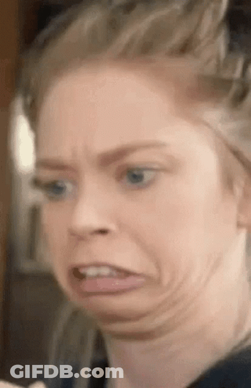 Girl Awkward And Confused Face GIF