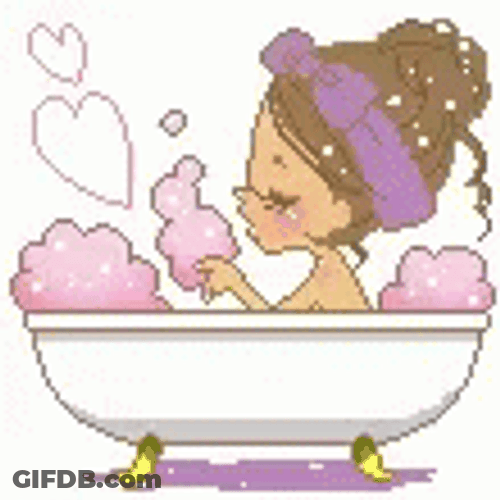 Girl Blowing Bubbles During Bubble Bath GIF