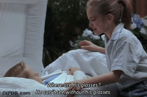 Girl Boy In Coffin Where Are His Glasses GIF
