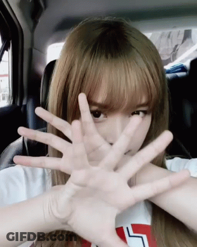 Girl Covering Face In Car With L Shirt GIF