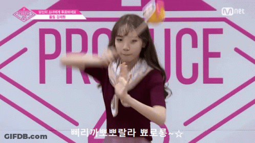 Girl Dancing In Front Of Produce GIF