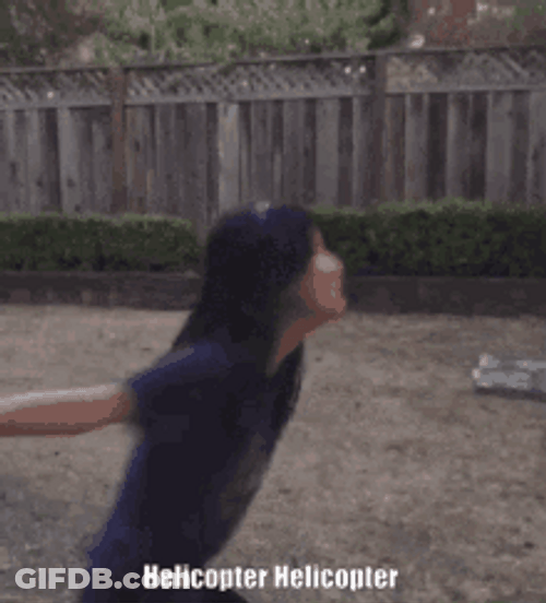 Girl Dizzy Spinning Like Helicopter Propeller GIF