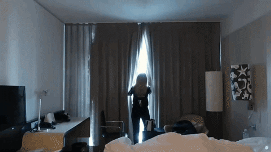 Girl Doing Curtain Opening GIF
