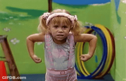 Girl Doing Push Ups With Hula Hoops GIF