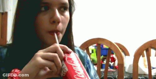 Girl Drinking Coca Cola Through Straw GIF
