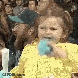 Girl Eating Cotton Candy GIF