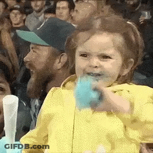 Girl Eating Cotton Candy GIF
