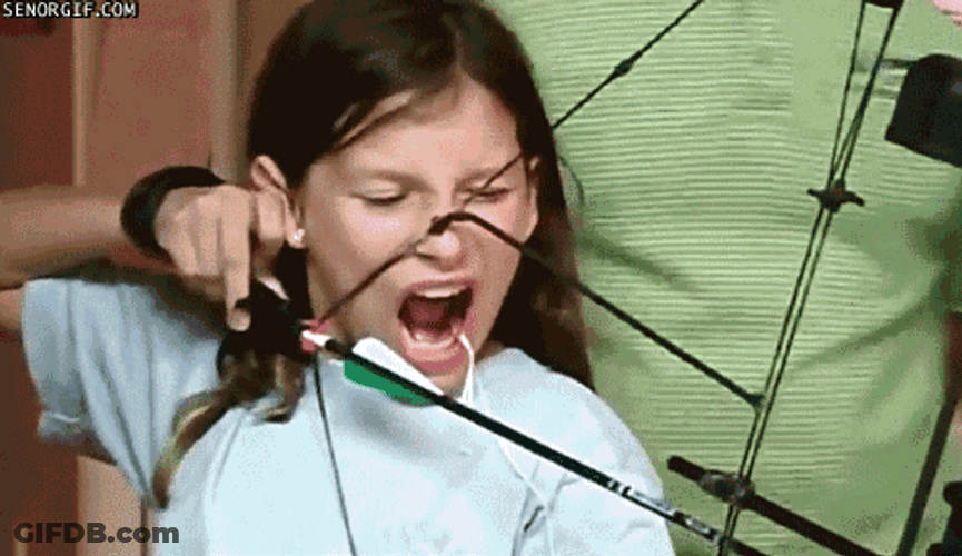 Girl Had A Missing Tooth On Archery GIF