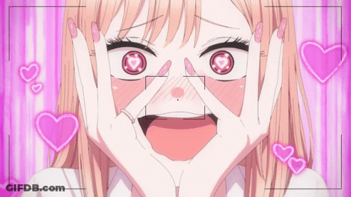 Girl Hands On Face Surrounded By Pink Hearts GIF