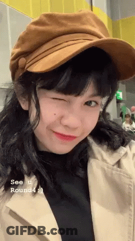 Girl Hat Trench Coat Winks See U Round4 GIF