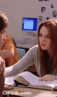 Girl Helping Boy With Homework GIF