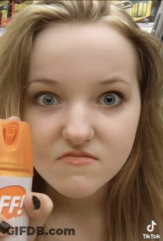 Girl Holding Bug Spray FF GIF