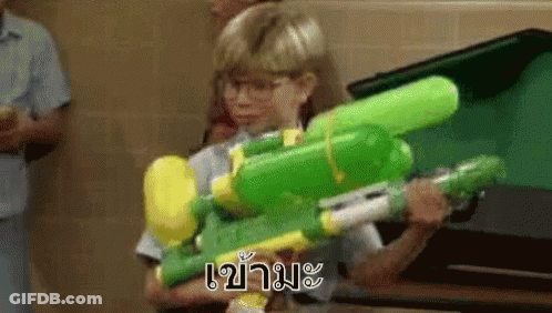 Girl Holding Green And Yellow Water Gun GIF