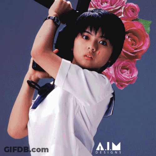 Girl Holding Gun In Front Of Pink Roses GIF
