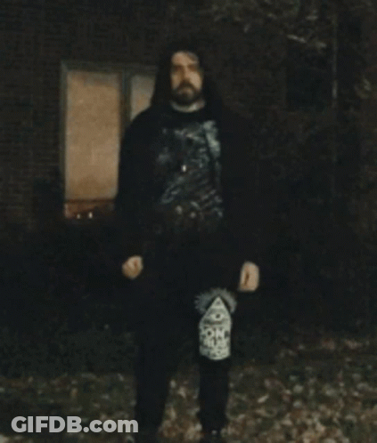 Girl Holding Lollipop Wearing The Rock Shirt GIF