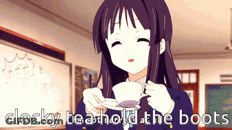 Girl Holding Tea Cup With Clocky Tea GIF