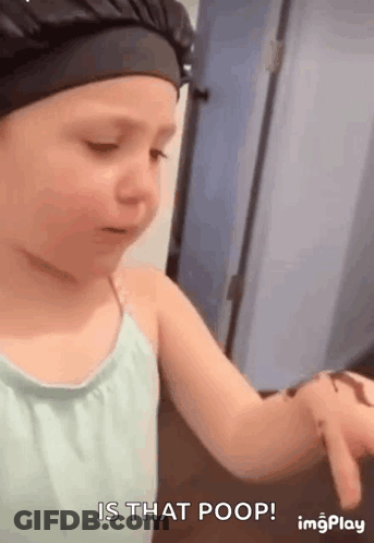 Girl In Bathing Cap Holding Chocolate Bar GIF