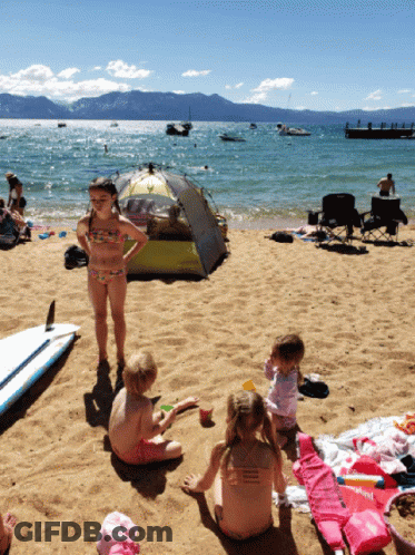 Girl In Bathing Suit On Beach Near Tent Saying Abercrombie & Fitch GIF
