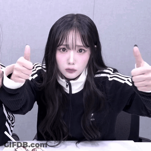 Girl In Black Adidas Sweater Giving Thumbs Up GIF