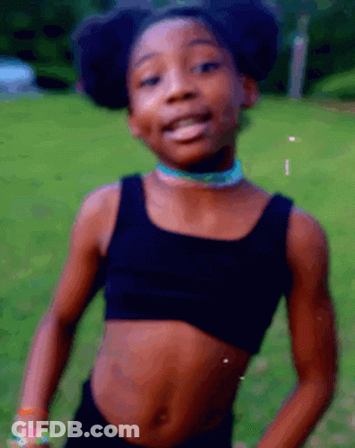 Girl In Black Crop Top And Shorts GIF