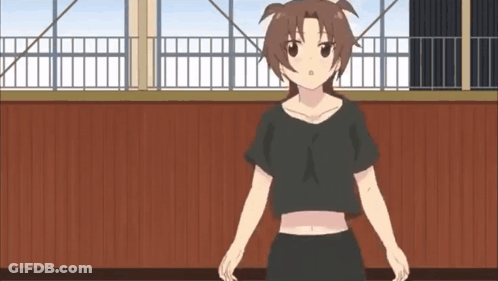 Girl In Black Crop Top Standing GIF