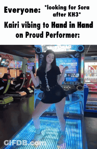 Girl In Black Dress Dancing At Arcade Machine GIF