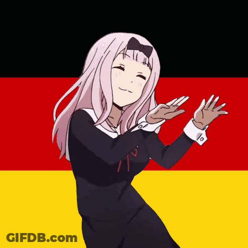 Girl In Black Dress Dancing In Front Of Red And Yellow Flag GIF