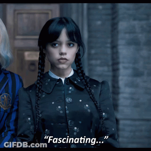 Girl In Black Dress Says Fascinating GIF