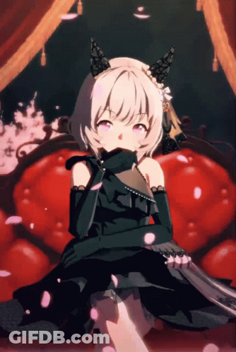 Girl In Black Dress Sitting On Red Chair GIF