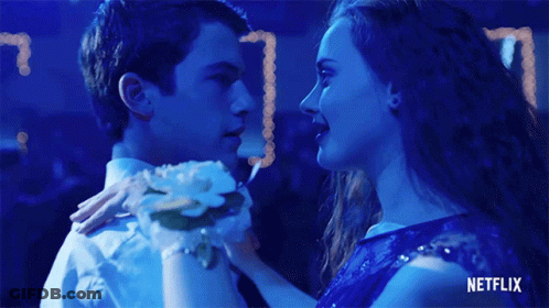 Girl In Blue Dress And Boy In White Dancing Netflix Logo GIF