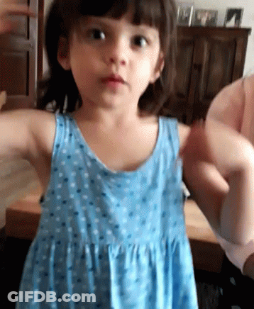 Girl In Blue Dress Being Held GIF