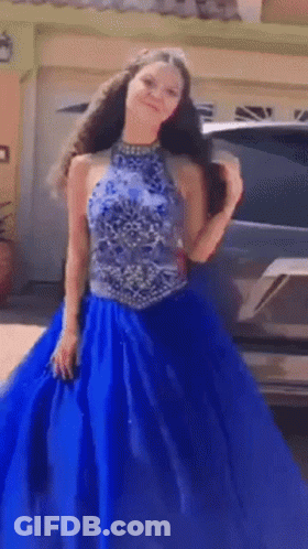 Girl In Blue Dress In Front Of Car GIF