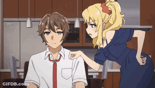 Girl In Blue Dress Pointing At Boy In White Shirt GIF