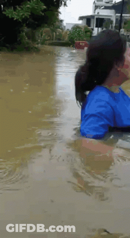Girl In Blue Flooded GIF