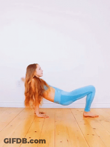 Girl In Blue Leggings Doing Yoga GIF