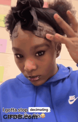 Girl In Blue Nike Hoodie Making A Face GIF