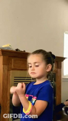 Girl In Blue Shirt And Pink Bracelet GIF