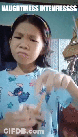 Girl In Blue Shirt Holding Cup Making Face GIF