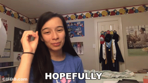 Girl In Blue Shirt Saying Hopefully GIF