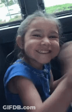 Girl In Blue Shirt Smiling And Clapping GIF