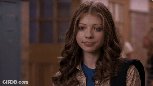 Girl In Blue Shirt With Backpack Letter M GIF