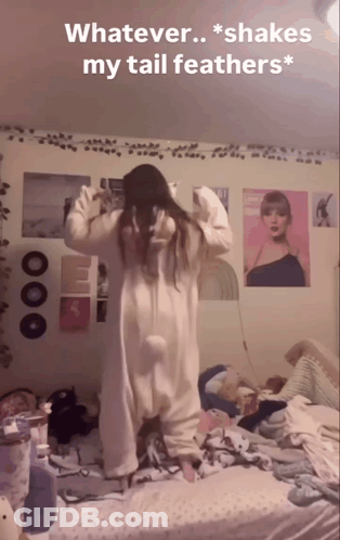 Girl In Cat Costume Shaking Tail Feathers GIF