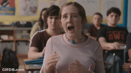 Girl In Classroom With Mouth Open GIF